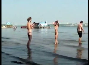 Nude damsels on the beach for swingers
